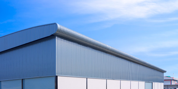 Reformas Integrales de Naves Industriales Sils · Instalción de Revestimiento de Paredes y Techos